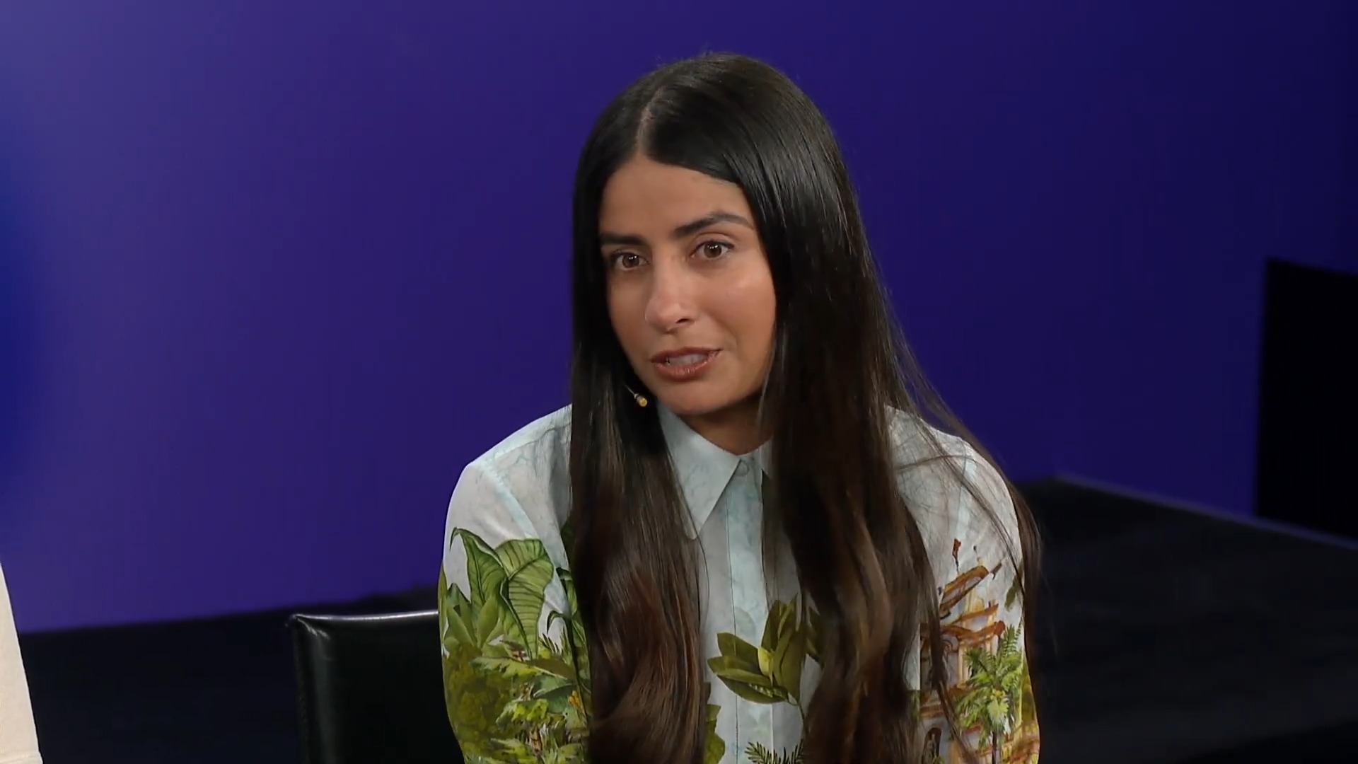 Asha Sharma in white shirt with leaf pattern