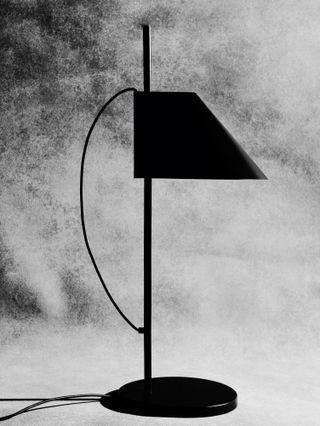 Black and white photograph of a table lamp by GamFratesi for Louis Poulsen