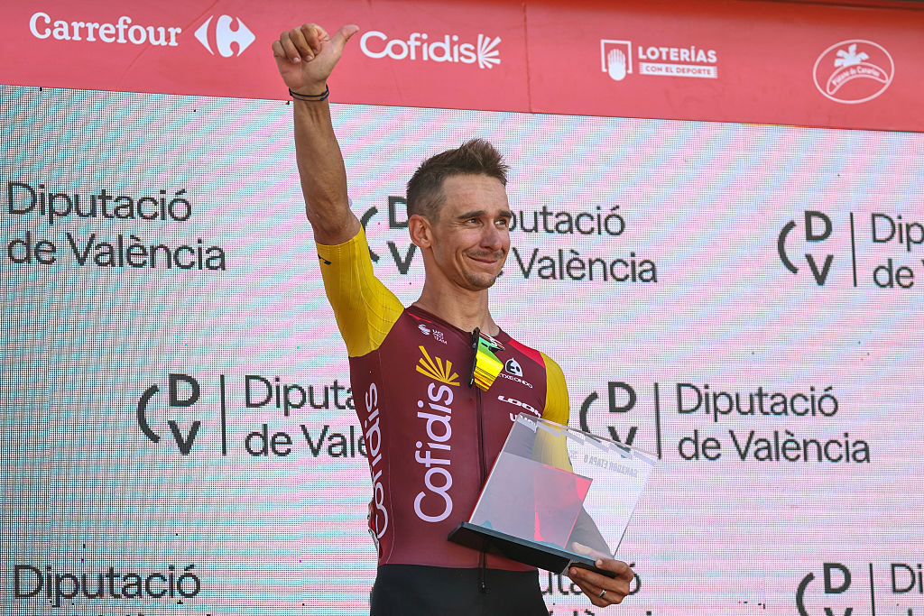 Team Cofidis' French rider Bryan Coquard celebrates on the podium after winning the eighth stage of the Vuelta a Espana 2026, a 171 km race between Pucol and Xeraco on August 29, 2026. (Photo by Josep LAGO / AFP)