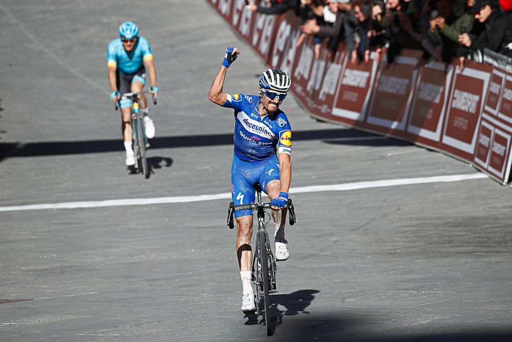 Julian Alaphilippe wins the 2019 Strade Bianche ahea dof Jakob Fuglsang