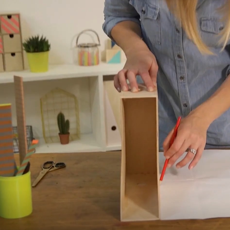 knuff magazine files with wrapping paper and pencil with scissors