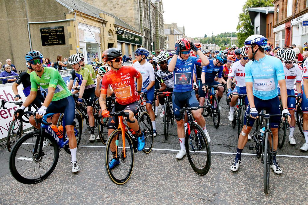 EDINBURGH SCOTLAND SEPTEMBER 11 LR Jacob Scott of United Kingdom and Team Canyon DHB Sungod green mountain jersey Robin Carpenter of United States and Team Rally Cycling red sprint jersey Ethan Hayter of United Kingdom and Team INEOS Grenadiers blue leader jersey and Michael Woods of Canada and Team Israel StartUp Nation turquoise points jersey prepare for the race prior to the 17th Tour of Britain 2021 Stage 7 a 1948km stage from Hawick to Edinburgh TourofBritain TourofBritain on September 11 2021 in Edinburgh Scotland Photo by Alex LiveseyGetty Images