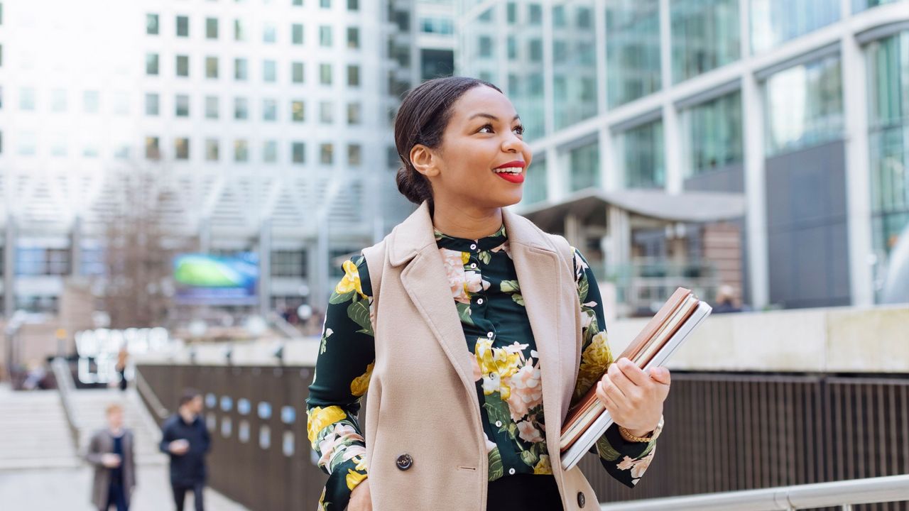 Woman holding books