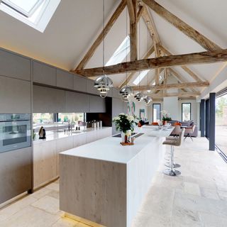 kitchen with white tiled flooring and white kitchen contours