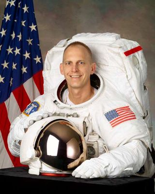 NASA astronaut Clayton Anderson poses for a portrait.