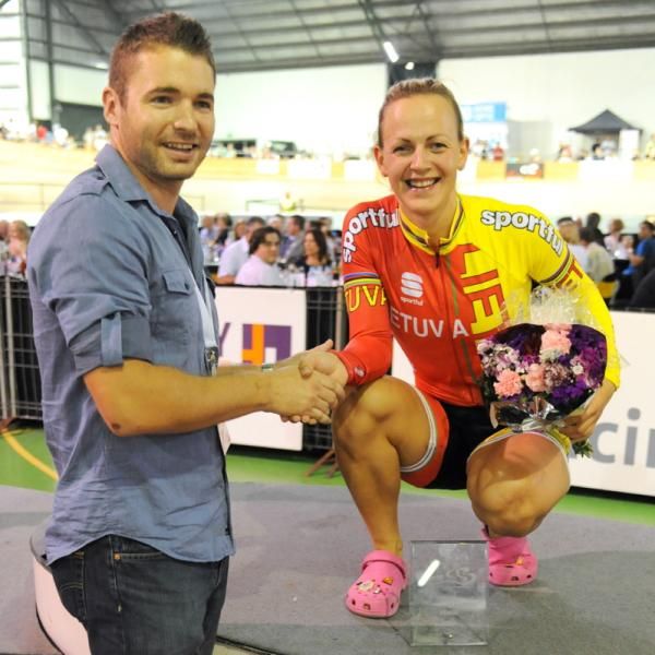 Simonia Krupeckaite being congratulated by Dan Scopinich from Highbury Homes.