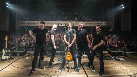 The Pineapple Thief pose on stage at the Islington Assembly Hall in London
