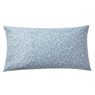 A blue floral patterned pillow case