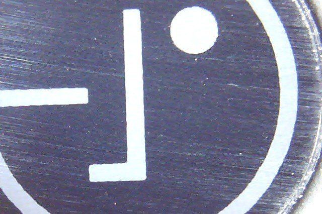 The LG logo is covered in glass &mdash; scratched glass