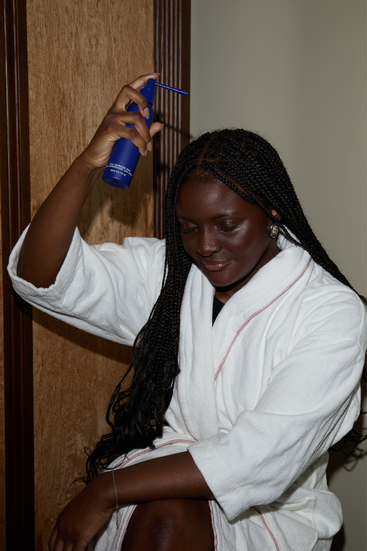 Brittany Davy testing the Cecred Scalp Refreshing Spray