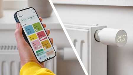 A hand holding a phone showing the IKEA app next to an IKEA Liljebagge smart thermostat on a radiator