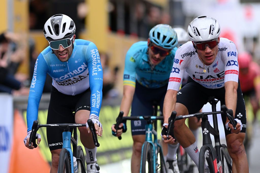 LAIGUEGLIA ITALY FEBRUARY 28 LR Andrea Vendrame of Italy and Team DecathlonAg2R La Mondiale crosses the finish line as second place winner ahead of Juan Ayuso of Spain and Team UAE Emirates as third place winner during the 61st Trofeo Laigueglia 2024 a 202km one day race from Laiguegli to Laigueglia on February 28 2024 in Laigueglia Italy Photo by Dario BelingheriGetty Images