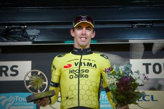 French rider of team Visma Lease A Bike Christophe Laporte celebrates on the podium after he won the 118th edition of the 213,9 km Paris-Tours one day cycling race, in Tours, central France on October 6, 2024. (Photo by GUILLAUME SOUVANT / AFP)