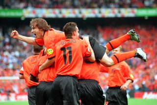 Netherlands players celebrate during their 6-1 quarter-final victory over FR Yugoslavia at Euro 2000