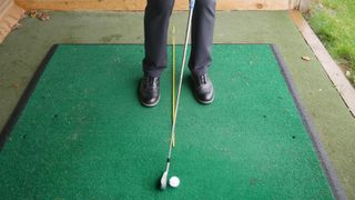 PGA pro Barney Puttick preparing a stinger shot at Essendon Golf Club