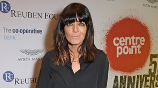 Claudia Winkleman poses on a red carpet