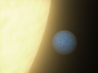 This artist's concept shows the super-Earth planet 55 Cancri e. It's a toasty world 41 light-years from Earth that rushes around its star every 18 hours.