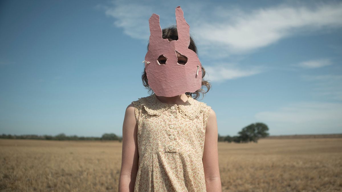 Lily LaTorre wearing a rabbit mask in Run Rabbit Run 