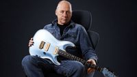 Mark Knopfler holds his 2011 Pensa Custom guitar