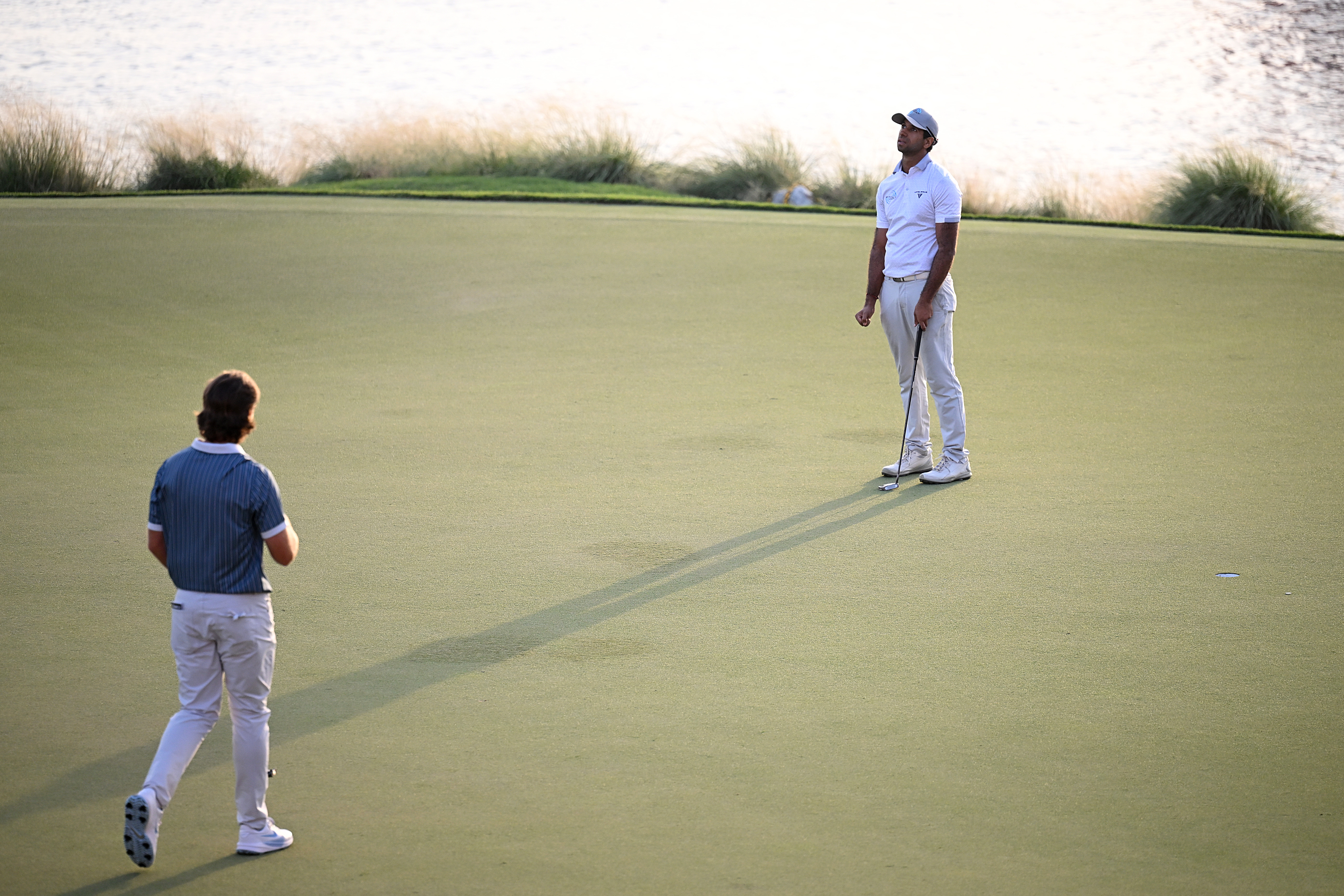 Aaron Rai celebrates his winning putt on the 18th green