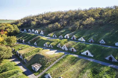 The rows of Hobbit hole-like wine cellar entrances at Hercegk&uacute;t