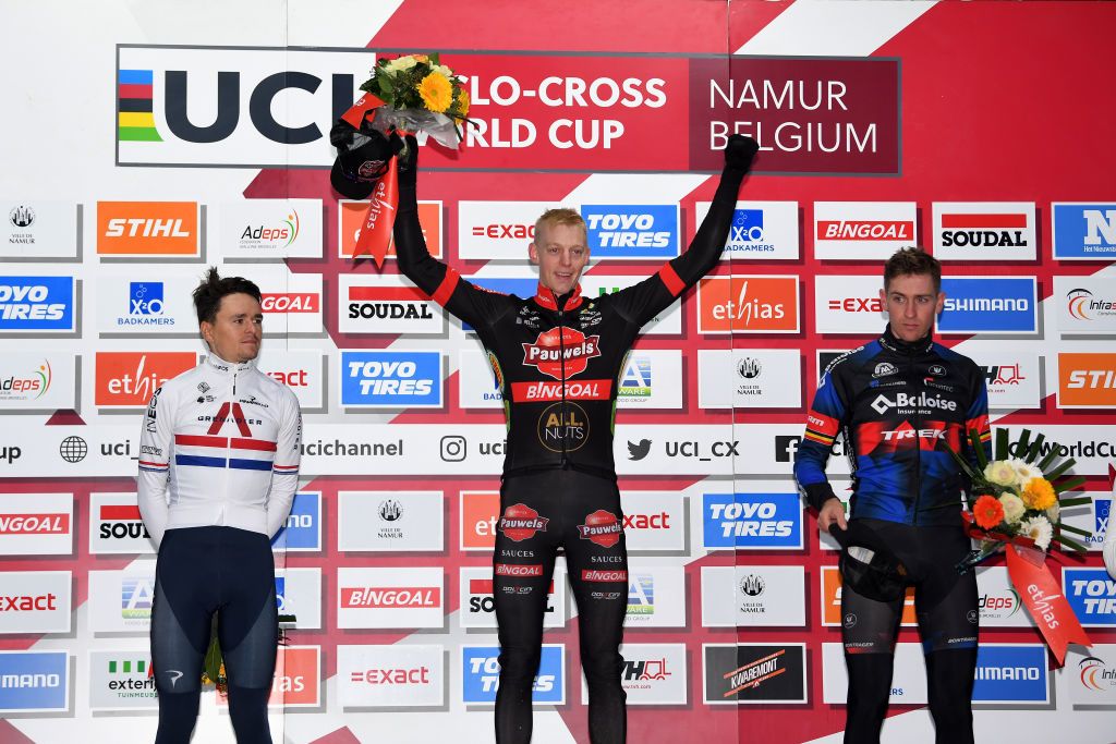 NAMUR BELGIUM DECEMBER 19 LR Thomas Pidcock of The United Kingdom and INEOS Grenadiers on second place race winner Michael Vanthourenhout of Belgium and Team Pauwels Sauzen Bingoal and Toon Aerts of Belgium and Team Baloise Trek Lions on third place pose on the podium during the podium ceremony after the 13th Namur UCI CycloCross Worldcup 2021 Mens Elite UCIWT on December 19 2021 in Namur Belgium Photo by Luc ClaessenGetty Images