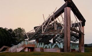 Music pavillion made of a web or wooden beams and girders