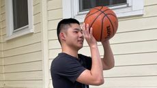 Brandon Shintani playing basketball.