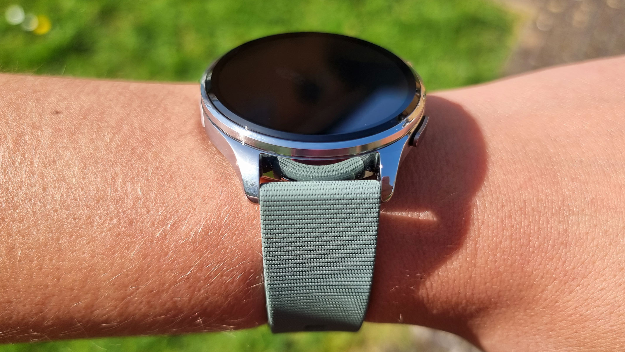 a close-up picture of our reviewer wearing the Xiaomi Watch 5, view from the side