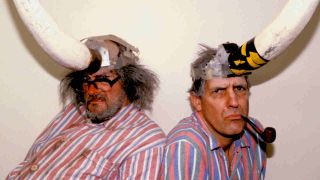The KLF posing for a photograph in pyjamas and giant horned helmets in 1997