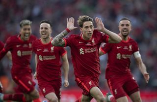 Konstantinos Tsimikas celebrates after scoring the winning penalty for Liverpool against Chelsea in the 2022 FA Cup final.