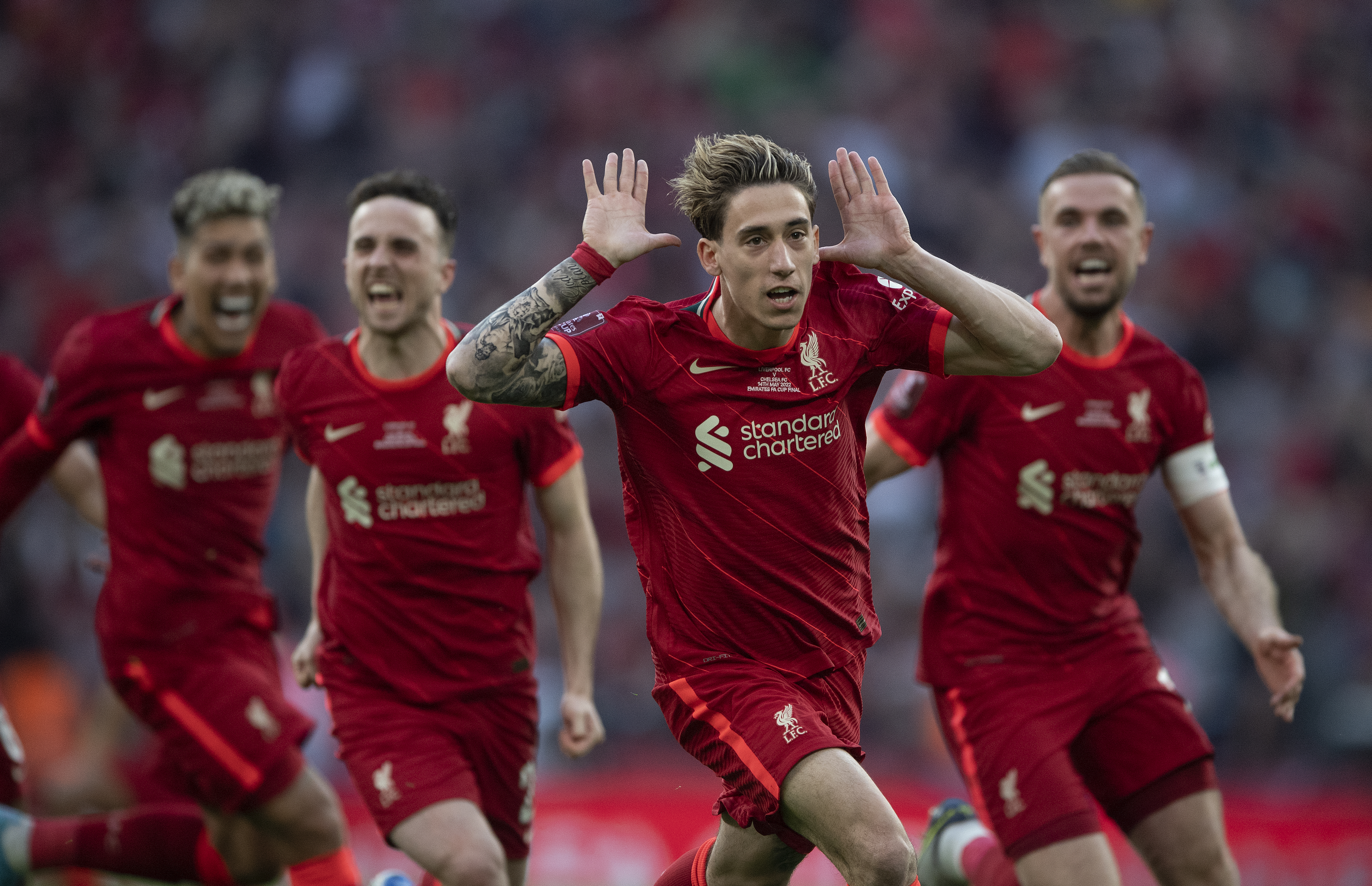 Konstantinos Tsimikas celebrates after scoring the winning penalty for Liverpool against Chelsea in the 2022 FA Cup final.