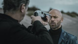Frank Gastambide, as Thomas, has a gun to his head in this image from Restless