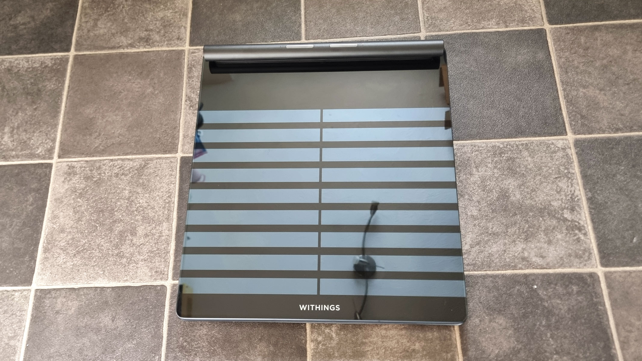 a picture of our reviewer's Withings Body Scan smart scale