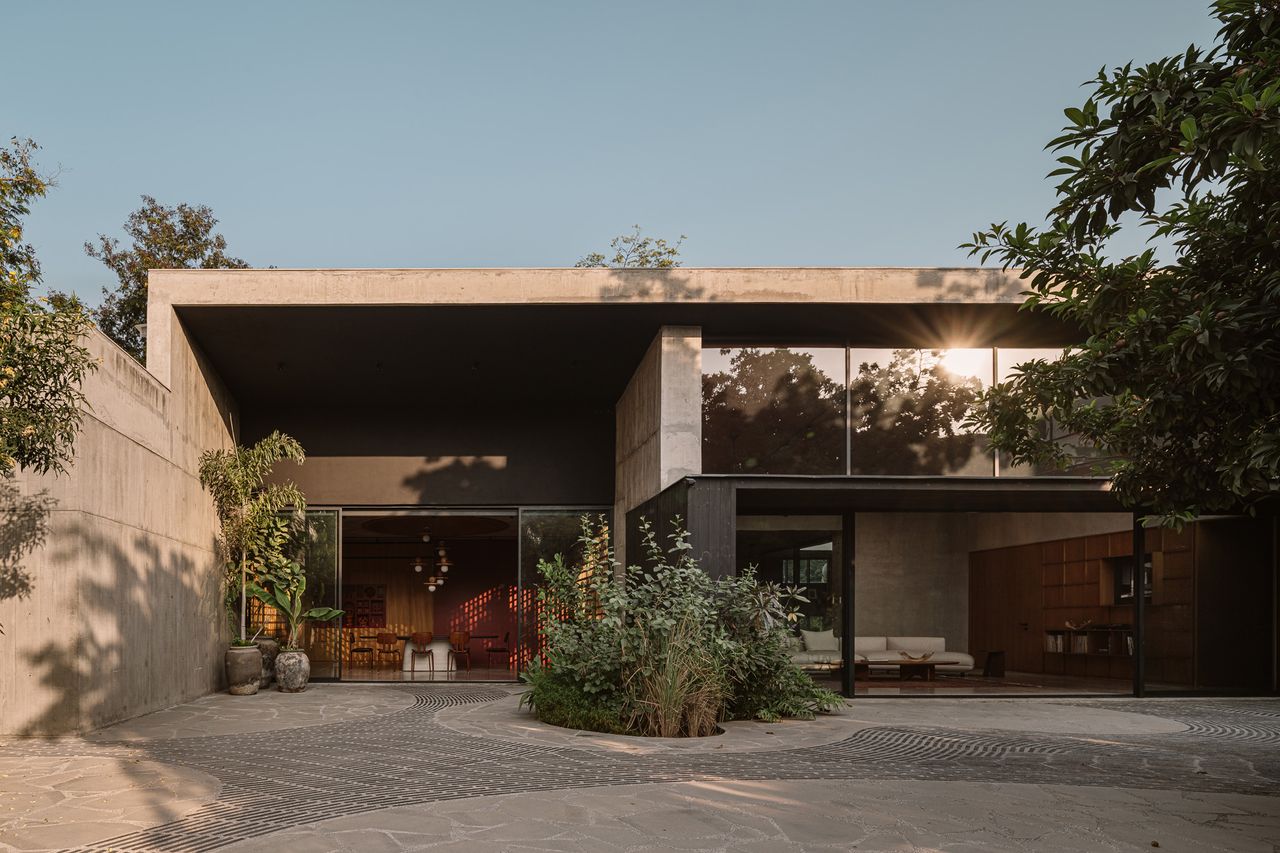 A contemporary Gujarat house is rooted in the dappled shade of two ancient sapodilla trees