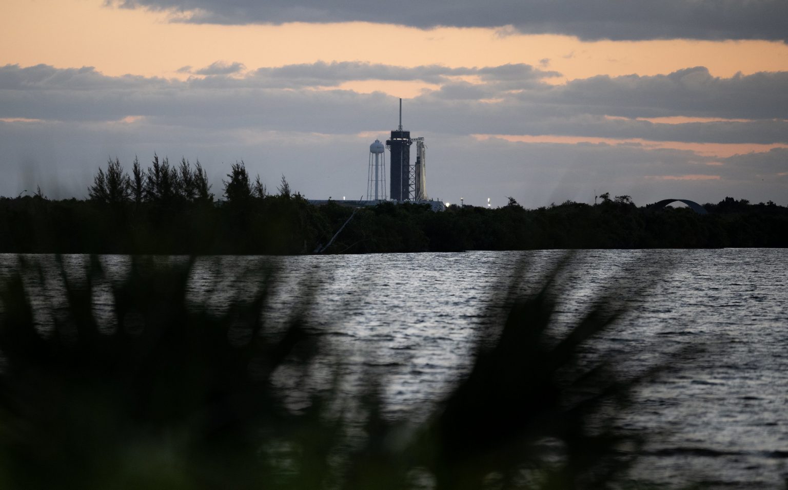 A SpaceX Falcon 9 rocket and Crew Dragon capsule, as seen on April 20, 2022, sit on Pad 39A at NASA's KSC in Florida ahead of the SpaceX Crew-4 launch on April 23, 2022.