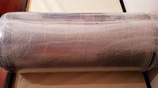 Nectar Premier Copper Mattress review: an image showing the Premier Copper rolled up inside a vacuum sealed covering