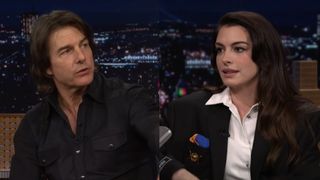 Anne Hathaway and Tom Cruise on The Tonight Show starring Jimmy Fallon, side by side.