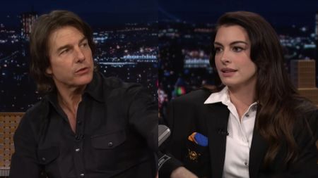 Anne Hathaway and Tom Cruise on The Tonight Show starring Jimmy Fallon, side by side. 
