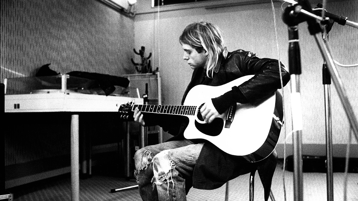 Kurt Cobain recording in Hilversum studios, playing acoustic guitar