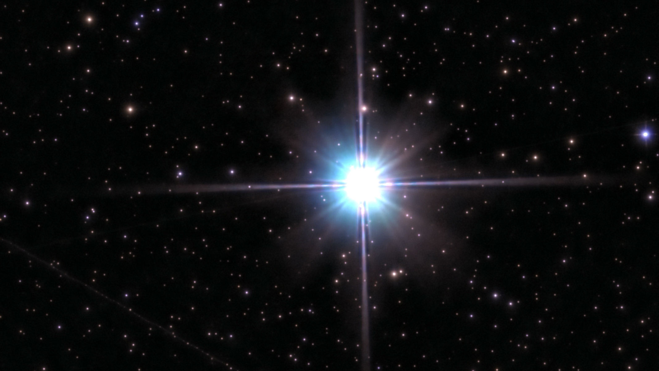 The star Vega shining in the starry night sky.