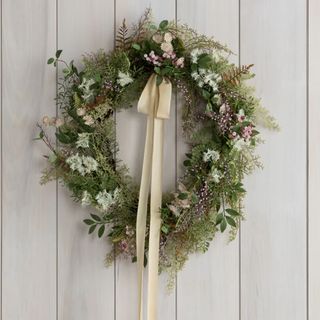 spring faux wreath with neutral ribbon