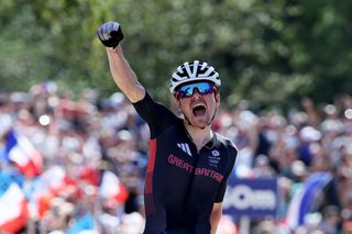 ELANCOURT FRANCE JULY 29 EDITORS NOTE Alternate crop Thomas Pidcock of Team Great Britain celebrates at finish line as gold medal winner during the Mens CrossCountry on day three of the Olympic Games Paris 2024 at Elancourt Hill on July 29 2024 in Elancourt France Photo by Alex BroadwayGetty Images