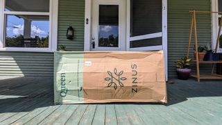 Zinus Green Trea mattress on porch