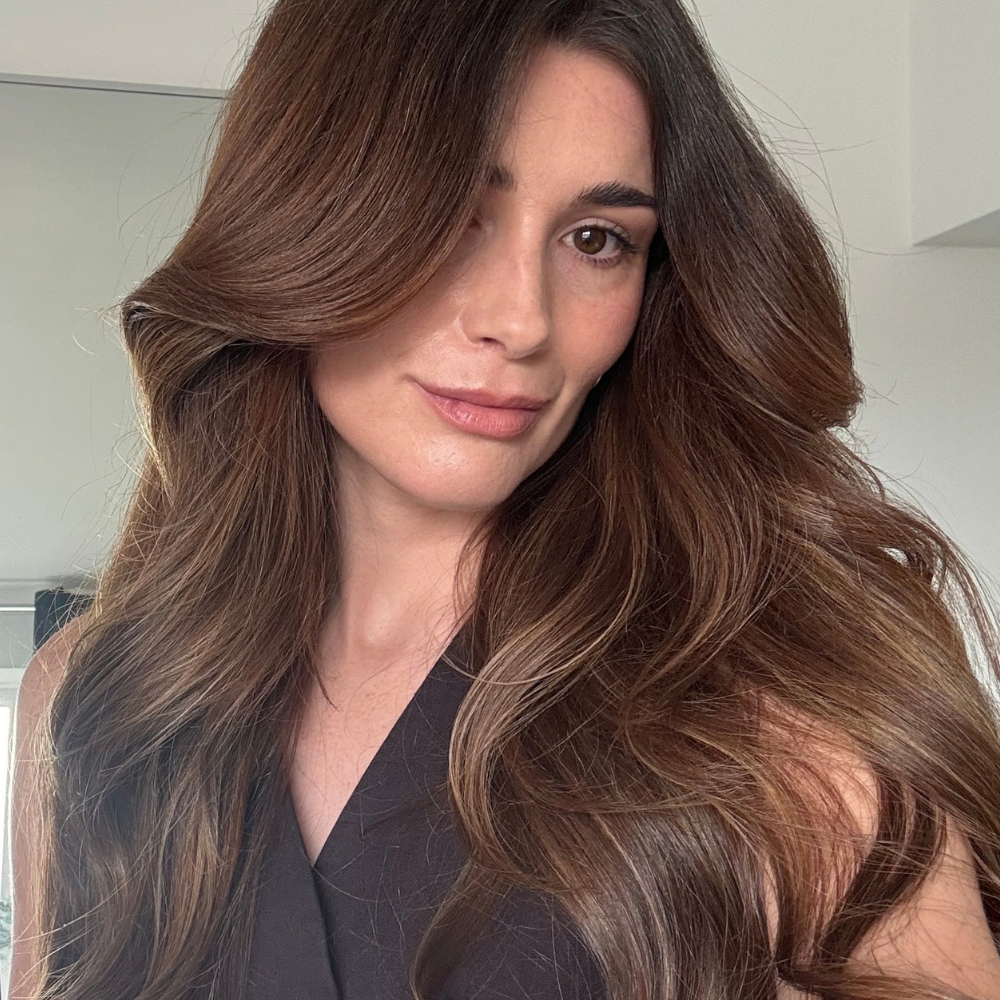 A selfie of beauty editor Eleanor Vousden using the Dyson Airwrap