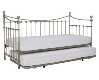Victorian-style day bed with two white mattresses