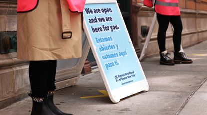 NEW YORK, NEW YORK - APRIL 16: Clinic escort volunteers stand outside of the Planned Parenthood in the Financial District neighborhood of Manhattan on April 16, 2021 in New York City. The Biden administration's Department of Health and Human Services has begun the process of undoing a Trump administration policy, known as Title X, that stripped federal family-planning dollars from clinics that refer patients for abortions, a move that drove Planned Parenthood to withdraw from the program. 