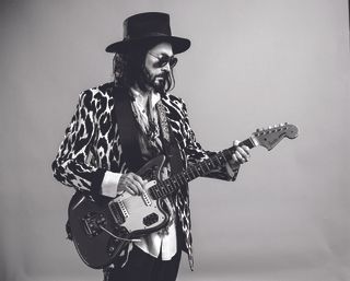 Mike Campbell shown in a publicity photo that accompanied the 2024 release of the Dirty Knobs album Vagabonds, Virgins and Misfits