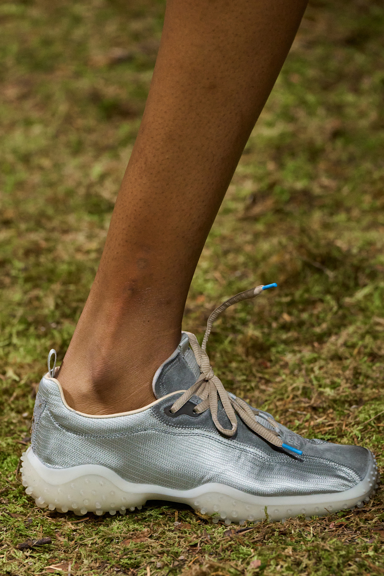 silver bubble-sole sneakers at Miu Miu Fall 2026 runway