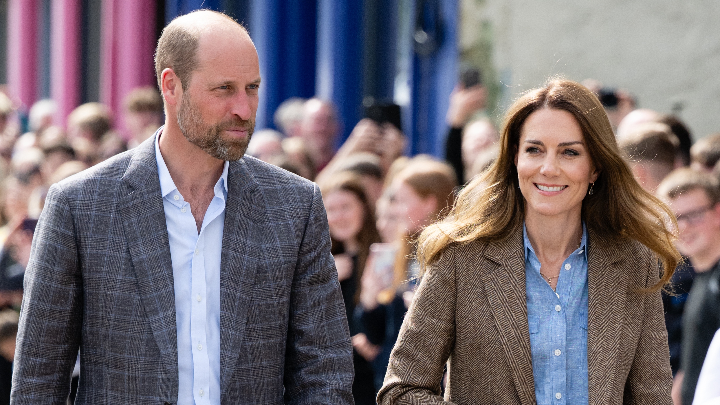 Prince William and Kate smile and walk during their visit to the Isle of Mull